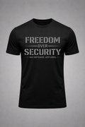 Black Freedom Over Security t-shirt by 405 Defense Apparel featuring bold distressed grey typography on the front chest with minimalist patriotic tactical styling.
