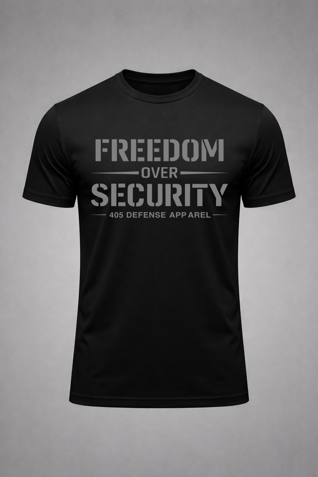Black Freedom Over Security t-shirt by 405 Defense Apparel featuring bold distressed grey typography on the front chest with minimalist patriotic tactical styling.
