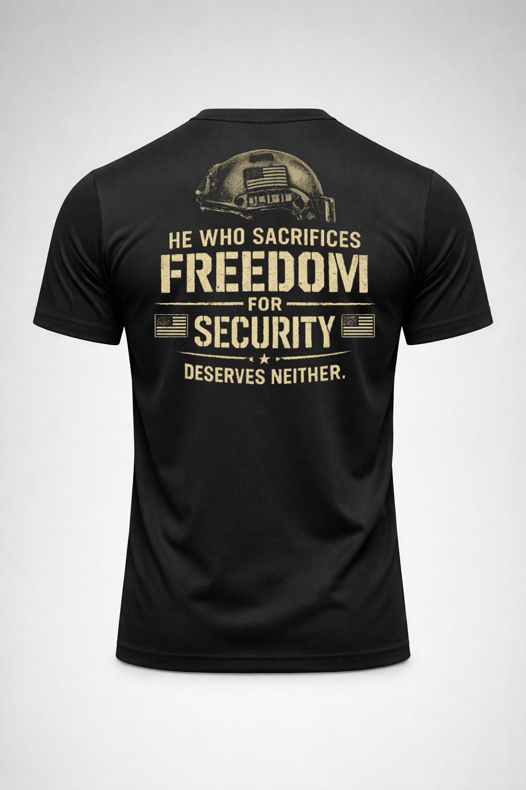 Black tactical-inspired t-shirt featuring a distressed helmet graphic and the quote “He Who Sacrifices Freedom For Security Deserves Neither” on the back.