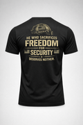Black tactical-inspired t-shirt featuring a distressed helmet graphic and the quote “He Who Sacrifices Freedom For Security Deserves Neither” on the back.
